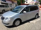 Volkswagen Touran foto 1