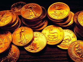 куплю золотые монеты  от 1100 до 2000лей за грамм