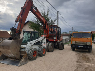 Servicii kamaz bobcat demorare evacuare basculanta buldoexcavator excavator miniexcavator