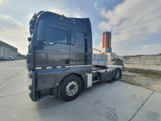 Companie transport + un camion MAN TGX-540