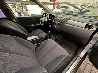 Nissan Tiida фото 7