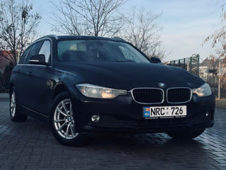 BMW 3 Series Touring foto 3