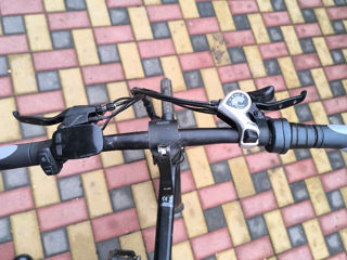 Bicicletă electrică foto 3