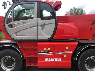 Телескопический погрузчик с поворотной башней Manitou MRT2470 foto 2