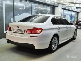 BMW 5 Series foto 2