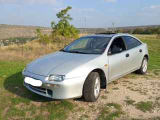 Mazda 323 foto 1