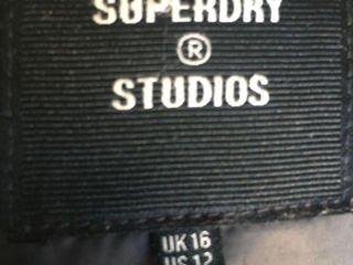 Очень тёплый и лёгкий пуховик фирмы Superdry, (синтетический антиаллергенный наполнитель), с хорошим foto 3