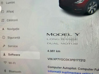 Tesla Model Y foto 1