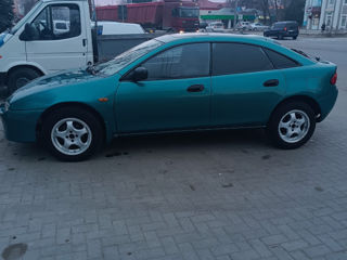 Mazda 323 foto 1