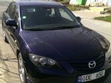 Mazda 3 foto 1