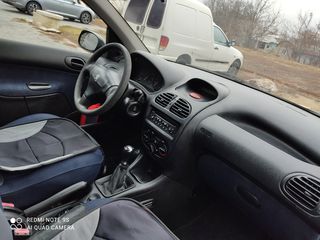 Peugeot 206 фото 9