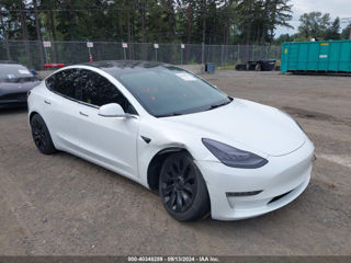 Tesla Model 3 foto 1