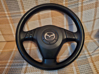 Mazda 3 volan foto 1