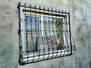 Lucrari din metal forjat ( porti, gratii pentru ferestre , perile ...) foto 7