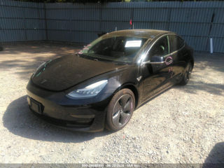 Tesla Model 3 foto 1