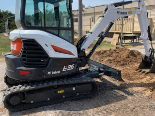 Excavator si Bobcat foto 6