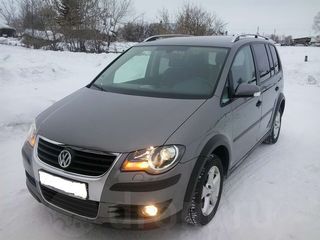 Volkswagen Touran foto 1