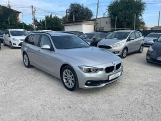 BMW 3 Series Touring foto 2