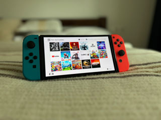 Nintendo Switch Oled - 4950 lei + Games