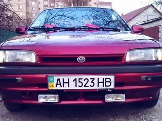 Mazda 323 foto 1