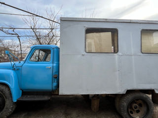 vand T40 si GAZ52,plugul la tractor foto 2