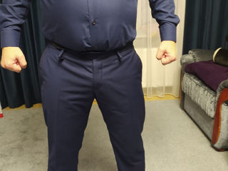 Pantaloni clasici noi de culoare albastra inchisi in stare foarte buna marimea XL la pret de 250 lei foto 2