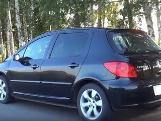 Peugeot 307 foto 1