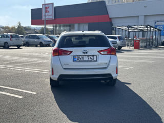 Toyota Auris Liber spre chrie foto 2