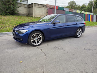 BMW 3 Series Touring foto 4