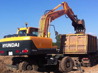 Servicii excavator incarcator buldozer lucrări de demolare constructii terasament excavare nivelare.