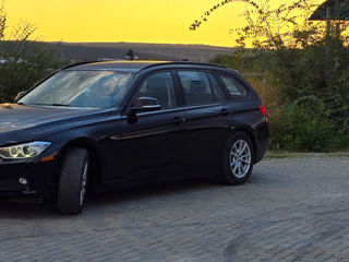 BMW 3 Series Touring foto 2