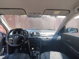 Mazda 3 foto 1