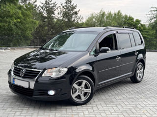 Volkswagen Touran фото 2