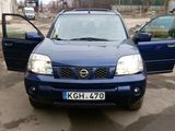 Nissan X-Trail foto 1