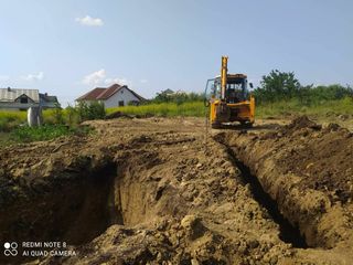 Oferim servicii buldoexcavator foto 4