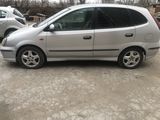 Nissan Almera Tino foto 1