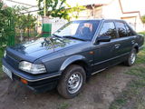 Mazda 323 foto 1