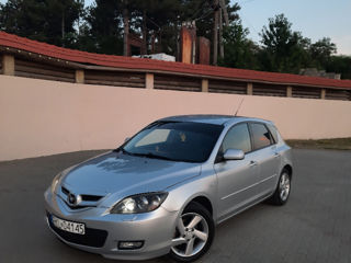 Mazda 3 foto 1