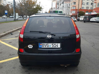 Nissan Almera Tino foto 4