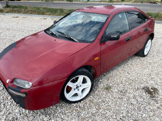 Mazda 323 foto 1