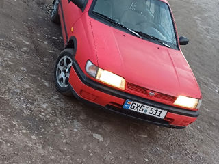 Nissan Sunny фото 0