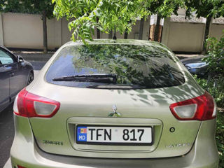 Mitsubishi Lancer фото 1