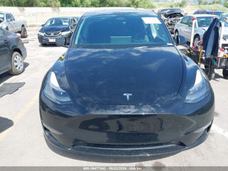 Tesla Model Y foto 1