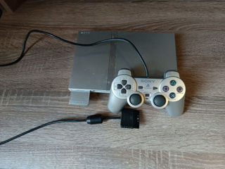 Продаю Play Station 2 Slim в полной комплетации + диски с играми.