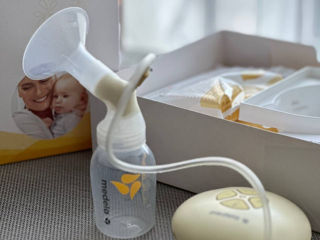 Молокоотсос Medela Swing