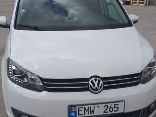 Volkswagen Touran foto 1