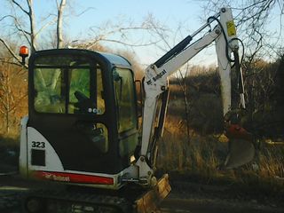 Lucrari cu  minitractor Bobcat foto 4