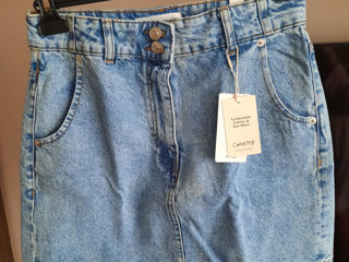 Продам новыую джинсовую юбку..длина 42 см..фирмы mango..с англии..раз.m...цена 500 лей