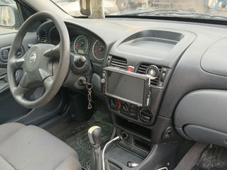 Nissan Almera foto 8