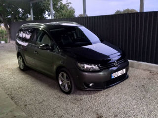 Volkswagen Touran foto 1